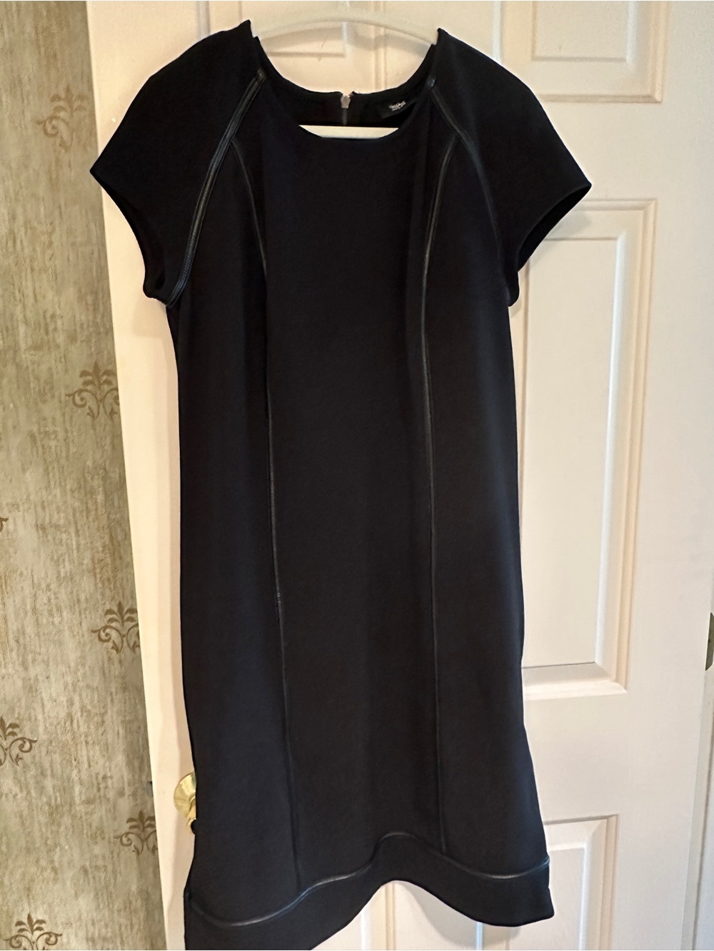 Little summer black dress. Faux leather detail on trim. 38” length.